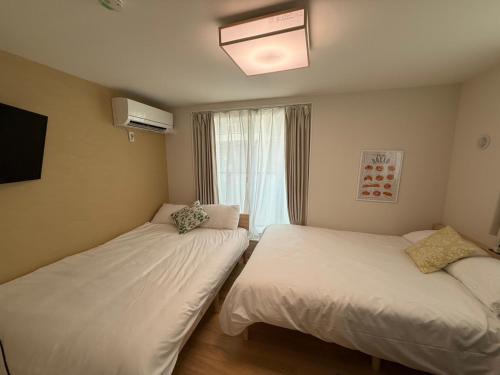Koenjikita Apartment | さくら旅館高円寺北千利休201号室