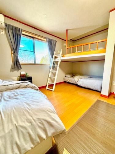 Tsu House | 暖炉の家三重観光の拠点伊勢神宮鈴鹿サーキットアクセス良好家族グループ旅行屋根付きbbq