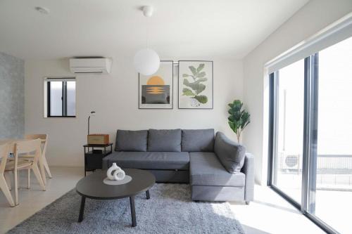 Ozu Apartment | Modern Home Near Kumamoto Airport by Restavio