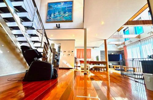 Tsu House | 暖炉の家三重観光の拠点伊勢神宮鈴鹿サーキットアクセス良好家族グループ旅行屋根付きbbq