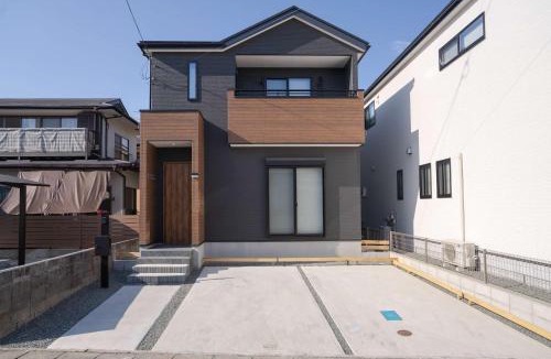 Ozu Apartment | Modern Home Near Kumamoto Airport by Restavio