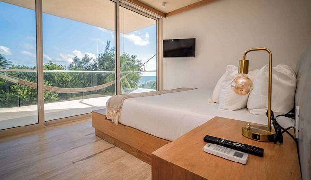 Beachfront Design Apartment | Rooftop Pool in Puerto Morelos