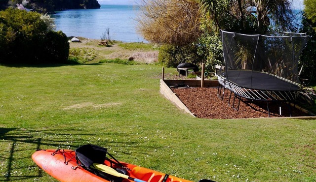 Beachfront Playground is a large family home with direct beach access in Kaiteriteri