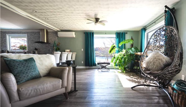 Riverfront Home with Outdoor Living Spaces and Hot Tub in Milton