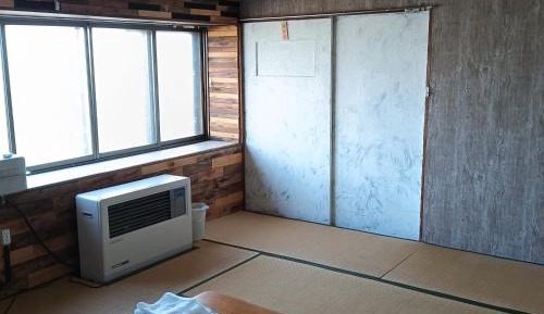 Japanese-Style Family Room with Shared Bathroom
