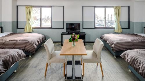 Quadruple Room with Shared Bathroom
