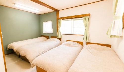 Economy Quadruple Room with Shared Bathroom