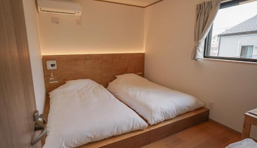 Twin Room with Shared Bathroom