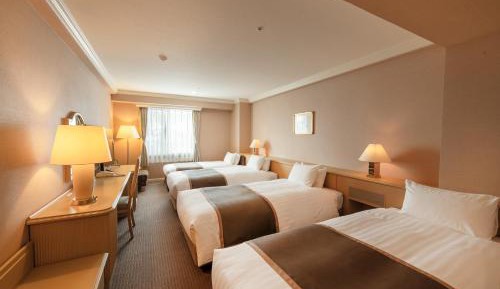 Triple Room with 1 Sofa Bed for 4 people - Non-Smoking