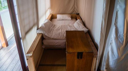 Single Bed in Female Dormitory Room