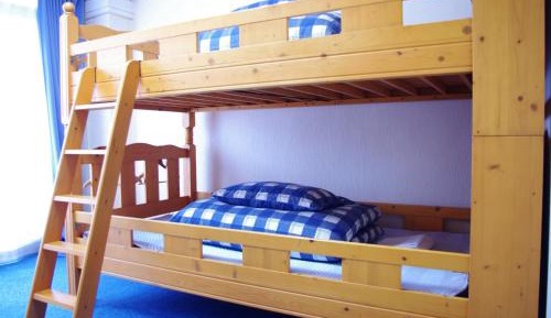 Bed in Female Dormitory Room without a curtain