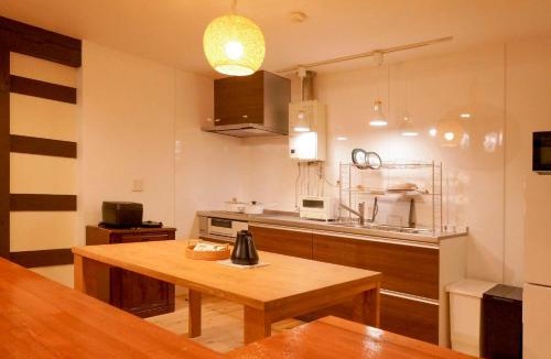 Kuroishi House | 灯リ蔵 AkariGura-Traditional Japanese Storehouse with Neputa Lanterns