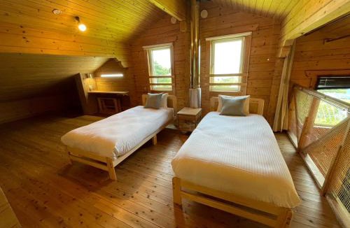 Toyoura Apartment | large log cabin 桜